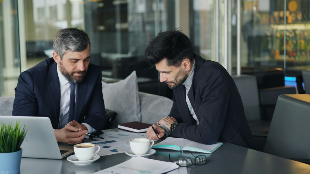 business team analyzing data charts