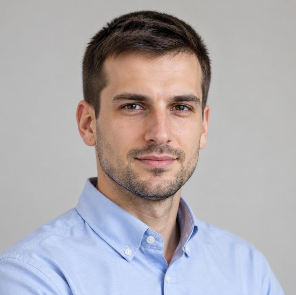 Portrait of a young man in a collared shirt